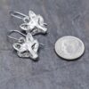 Handmade-silver-fox-head-dangle-earrings-on-white-background