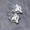 Handmade-silver-fox-head-dangle-earrings-on-white-background