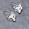 Handmade-silver-fox-head-dangle-earrings-on-white-background