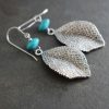 Long silver leaf earrings