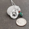 Bear print with garnet, green quartz, turquoise Bear print with garnet, green quartz, turquoise