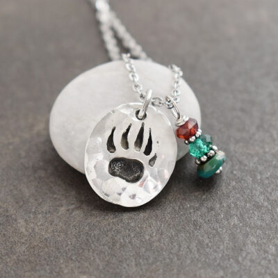 Bear print with garnet, green quartz, turquoise Bear print with garnet, green quartz, turquoise