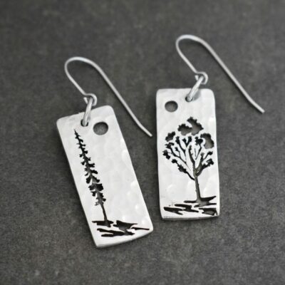 Into the woods earrings long rectangles with a pine tree and aspen tree on them
