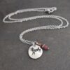 Shop our handmade Jumping Whitetail Deer Necklace featuring natural Pink Tourmaline. A perfect nature-inspired gift for hunters or somone with a October or Januray brithstone. Lead-free & tarnish-resistant.” Handmade silver pewter jumping whitetail deer necklace with faceted copper quartz, garnet, pink tourmaline gemstones