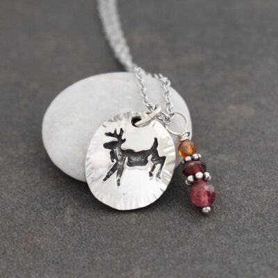 Shop our handmade Jumping Whitetail Deer Necklace featuring natural Pink Tourmaline. A perfect nature-inspired gift for hunters or October birthdays. Lead-free & tarnish-resistant.” Jumping Whitetail Deer Necklace, Pink Tourmaline Natural Gemstone wildharegems.com