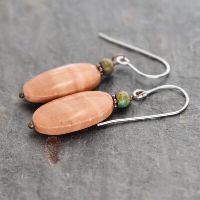 green brown small stone with long oval peach stone earrings
