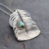 Silver lager Turkey Feather Pendant