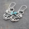silver anchor on a silver ring with white pearls and blue gemstone Earrings