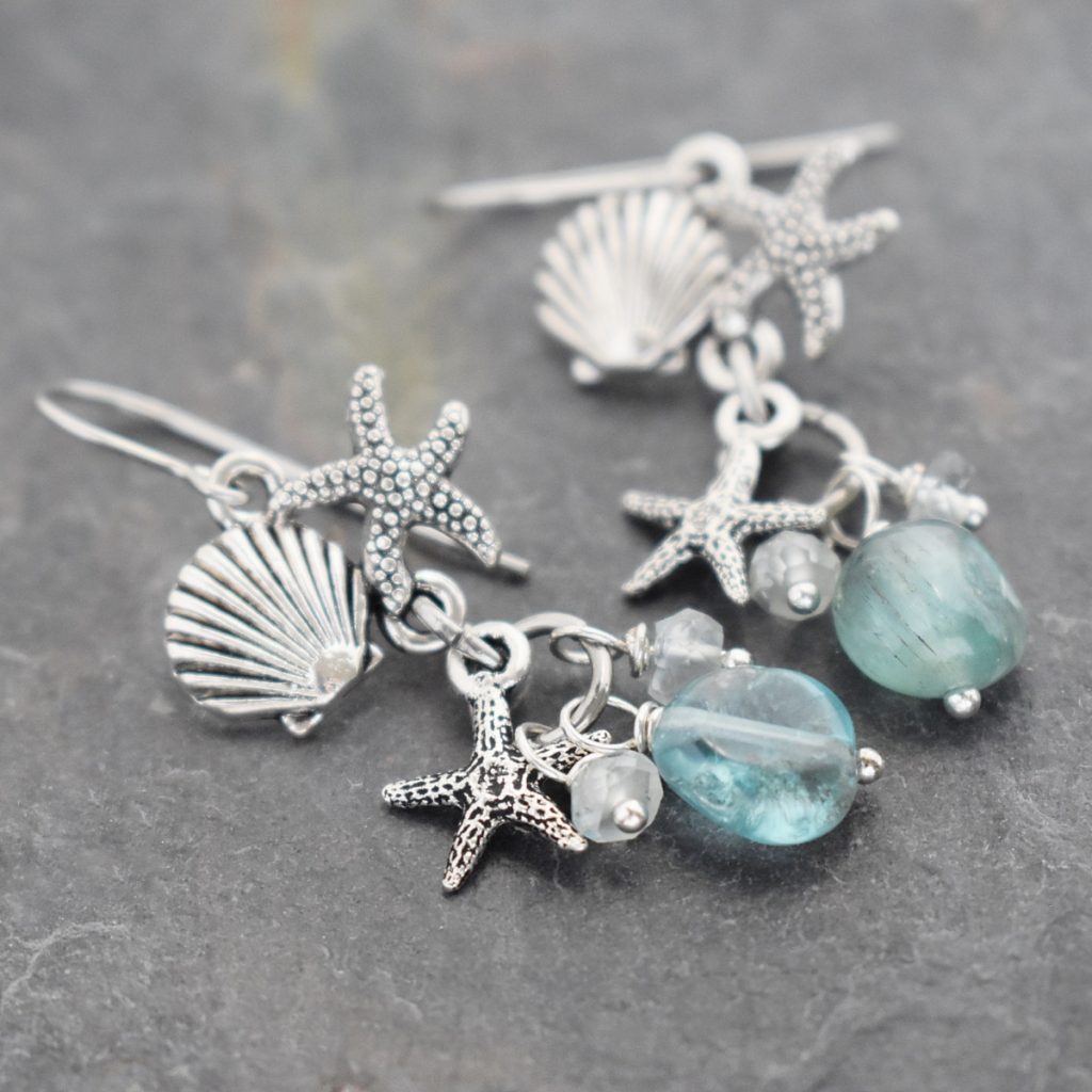 Silver starfish & seashell earrings with blue gemstones