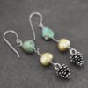 Long turquoise chunk and green pearl with silver pine cone earrings