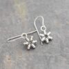Tiny sliver snowflake earrings
