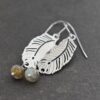handmade boho feather and labradorite earrings Handmade silver feather earrings with round blue-flash labradorite gemstone beads