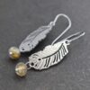 handmade boho feather and labradorite earrings Handmade silver feather earrings with round blue-flash labradorite gemstone beads