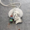 Wolf head with garnet, topaz, turquoise necklace