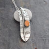 Silver Red-tailed hawk feather necklace with orange spiney oyster Silver Red-tailed hawk feather necklace