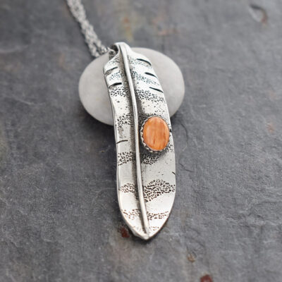 Silver Red-tailed hawk feather necklace with orange spiney oyster Silver Red-tailed hawk feather necklace