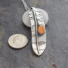 Silver Red-tailed hawk feather necklace with orange spiney oyster Red-tailed hawk feather necklace