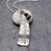 Main shot of necklace Handmade turkey feather charm necklace with natural sunstone, iolite and turquoise gemstones