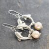 Dolphins and blush pink pearl earrings (5) Dolphins and blush pink pearl earrings (5)