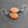 Dangle Tearl jade and orange carnelain gemstone earrings (3) Dangle Tearl jade and orange carnelain gemstone earrings (3)