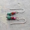 Natral ruby, garnet, turquoise earrings (2) "Handmade gemstone earrings featuring faceted pink ruby, red garnet, and turquoise beads, copper spacers on silver wires."