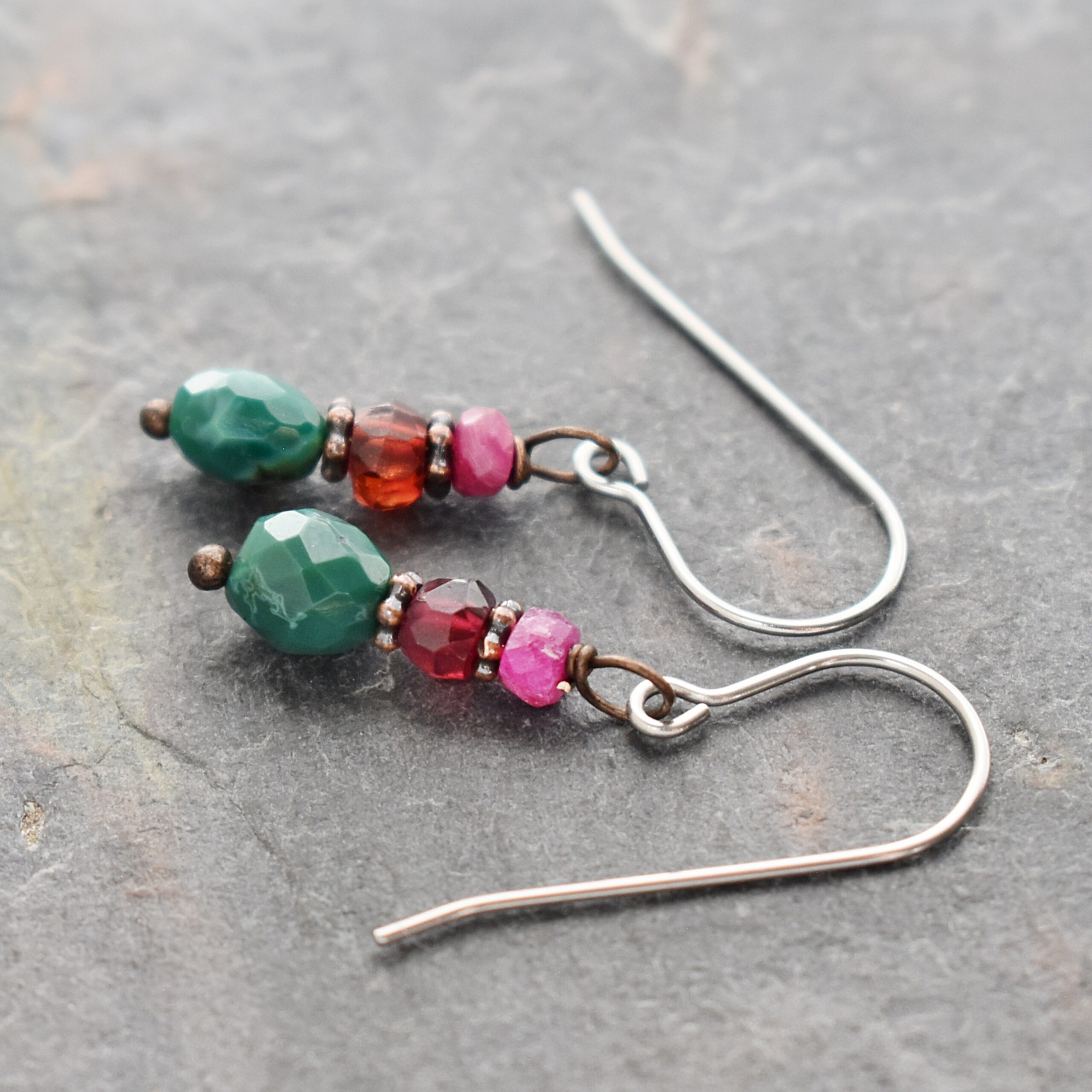 Handmade Natral ruby, garnet, turquoise gemstone earrings "Handmade gemstone earrings featuring faceted pink ruby, red garnet, and turquoise beads, copper spacers on silver wires."