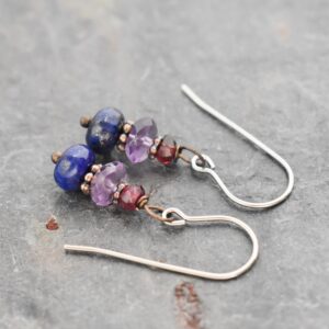 Handmade gemstone earrings with garnet, purple amethyst and blue lapis stone with copper spacers.