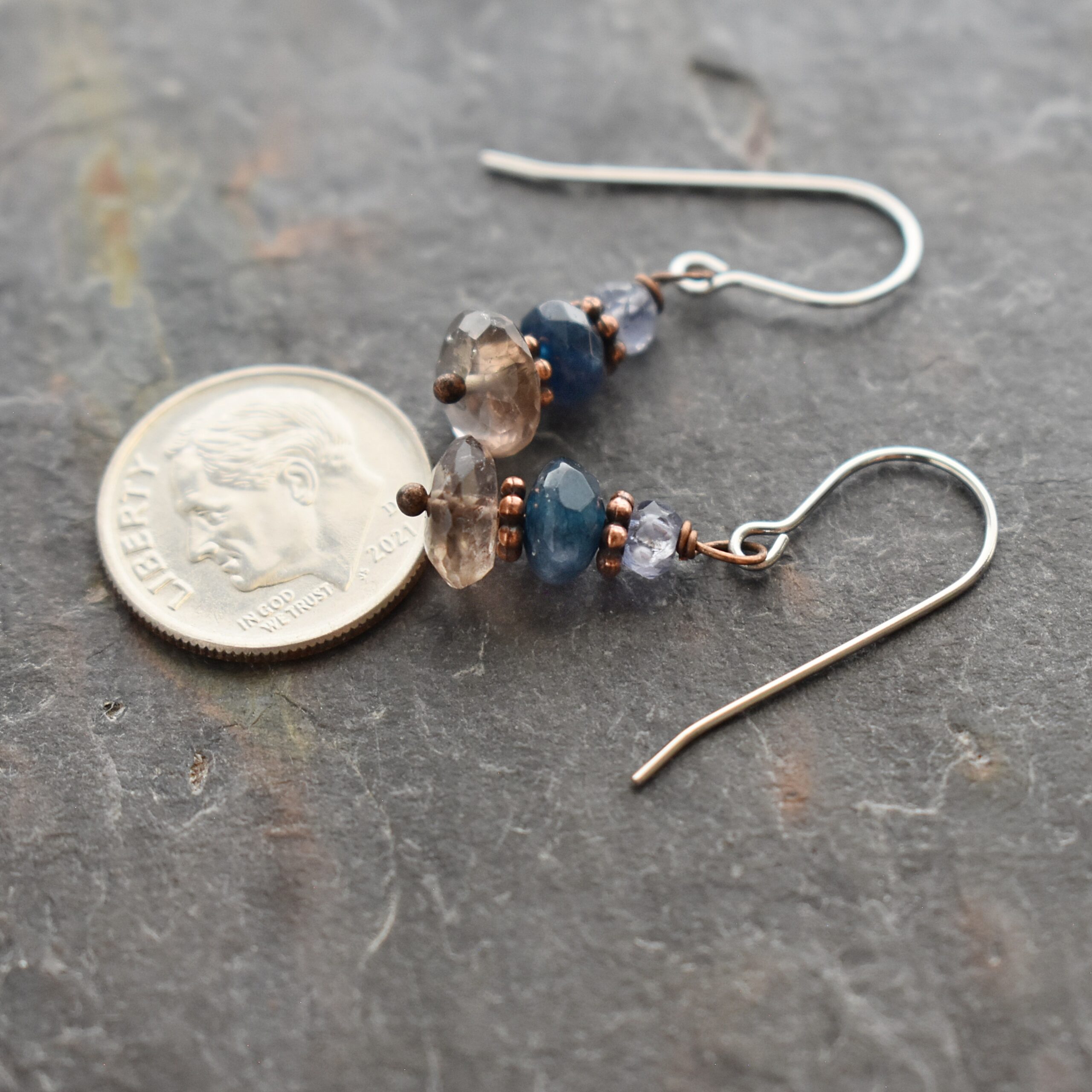 Handmade Tanzanite Sapphire Smoky Quartz Gemstone Earrings Handmade gemstone earrings with lavender blue tanzanite, dark blue sapphire, and brown smoky quartz stones with copper spacers.