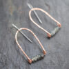 copper-rainbow-apatite-earrings-front.jpg Hand-forged copper rainbow apatite dangle earrings on Gray background