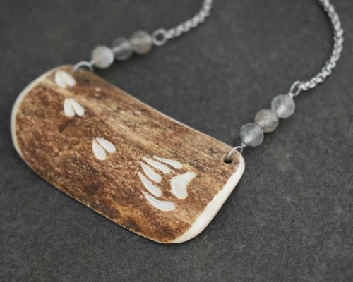 Caribou Antler with carved bear and moose prints Caribou Antler with carved bear and moose prints