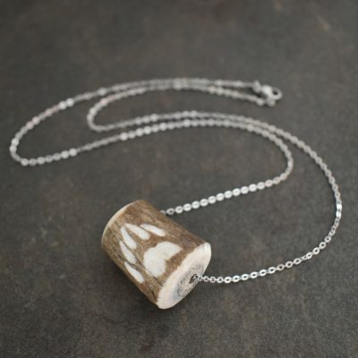 Carved Dark Elk antler with bear elk track Necklace Carved Dark Elk antler with bear elk track Necklace