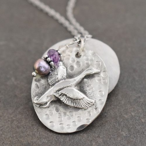 Duck Necklace with pearl (4) Oval pendant with flying duck with lavender gemstones and pearl